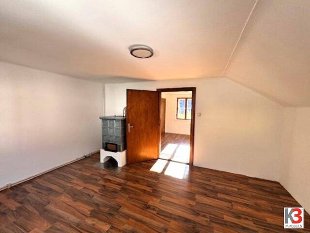 Immobilie in Scheffau am Tennengebirge - K3 - Aufstrebendes Scheffau! Charmantes Häuschen mit Doppelgarage auf großzügigem Grundstück mit Bach! - Bild 1