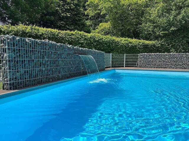 Immobilie in Wolfern - Architektenhaus inmitten eines wunderschönen Gartens, mit Wellness- und Wohlfühloase und Doppelgarage - Bild 2