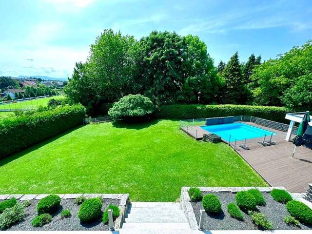 Immobilie in Wolfern - Architektenhaus inmitten eines wunderschönen Gartens, mit Wellness- und Wohlfühloase und Doppelgarage - Bild 3