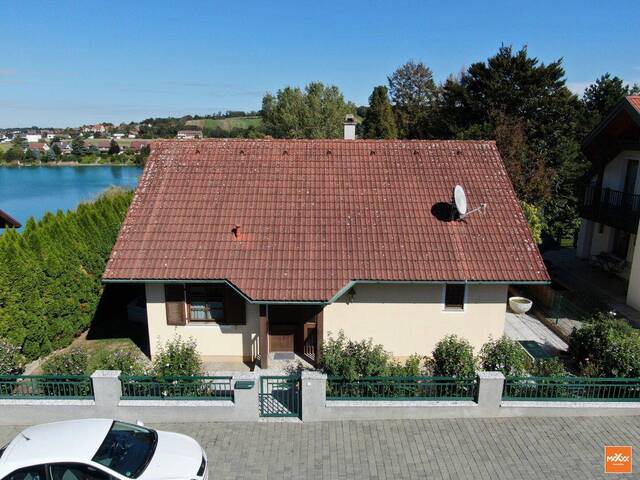 Immobilie in Wimpassing an der Leitha - Wohnen am See - ganzjähriges Wohnen - schönes Einfamilienhaus in absoluter Ruhelage! - Bild 1