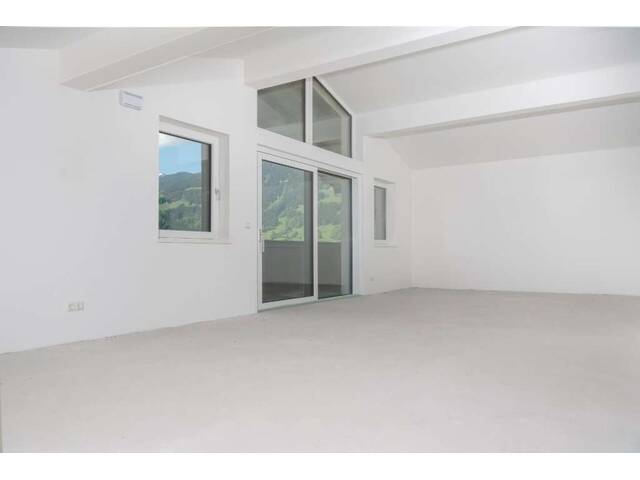 Immobilie in Saalfelden am Steinernen Meer - Förderung möglich! Sonnige Dachgeschosswohnung am Stadtrand von Saalfelden! - Bild 2