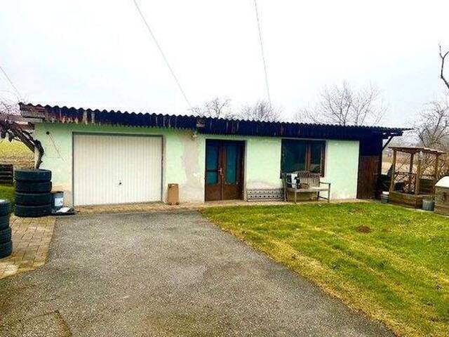 Immobilie in St. Martin im Sulmtal - St. Martin/Gasselsdorf: Freundliches Einfamilienhaus mit Nebengebäude und ebenen Grundstück - Bild 3