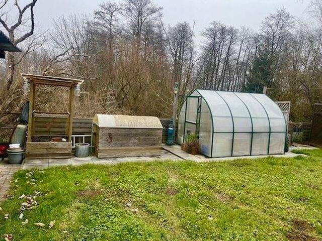 Immobilie in St. Martin im Sulmtal - St. Martin/Gasselsdorf: Freundliches Einfamilienhaus mit Nebengebäude und ebenen Grundstück - Bild 4