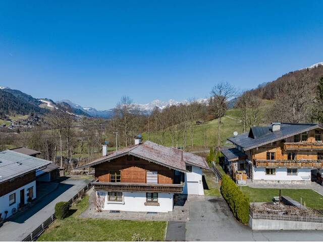 Immobilie in Aurach bei Kitzbühel - Neubau Chalet in idyllischer Lage von Aurach - Bild 1