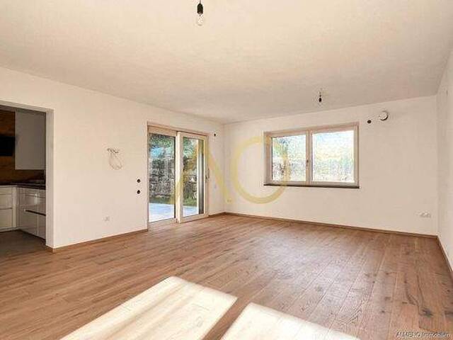 Immobilie in Kirchbichl - Ein nagelneuer Bungalow sonnig und ruhig mit Garten im Zentrum von Kirchbichl - Bild 1
