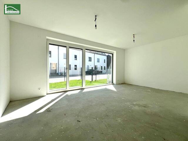 Immobilie in Achau - Erstbezug, Ziegelmassiv-Bauweise, 3-Schichtverglasung, Luftwärmepumpe, Stellplätze, S-Bahn 5 Minuten entfernt. - WOHNTRAUM - Bild 1