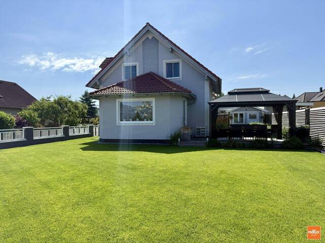 Immobilie in Wimpassing an der Leitha - Wohnen wie im Urlaub – Charmantes Einfamilienhaus mit Seezugang - Bild 0