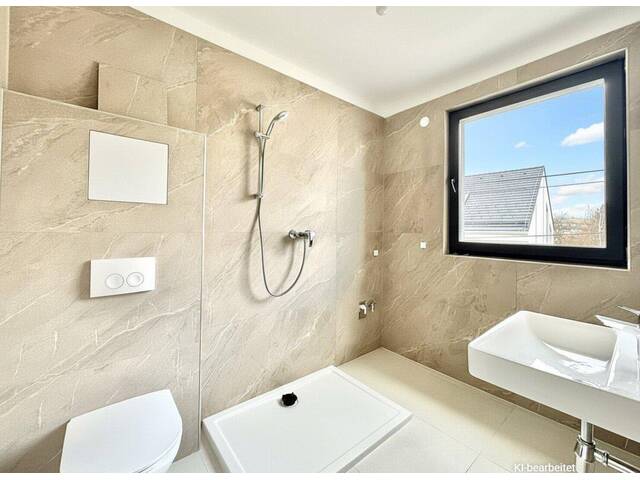 Immobilie in Wolkersdorf im Weinviertel - ERSTBEZÜGE I ~13 Minuten von Wien I schlüsselfertig I Luftwärmepumpe I Stellplätze I Bahnhofsnähe - Bild 2