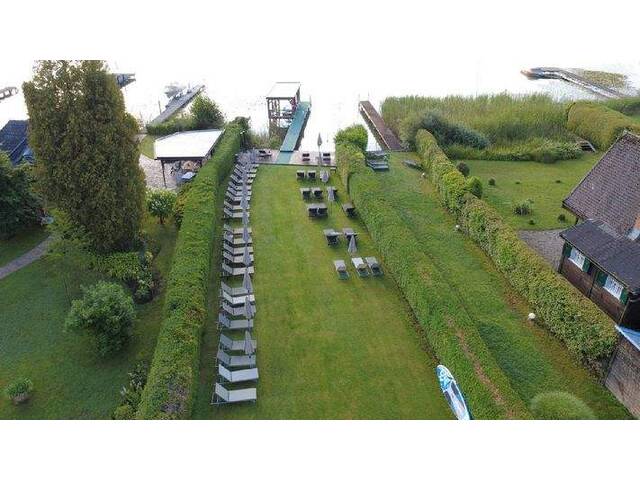 Immobilie in Krumpendorf - Exklusive Eigentumswohnung am See mit Privatstrand - Bild 1