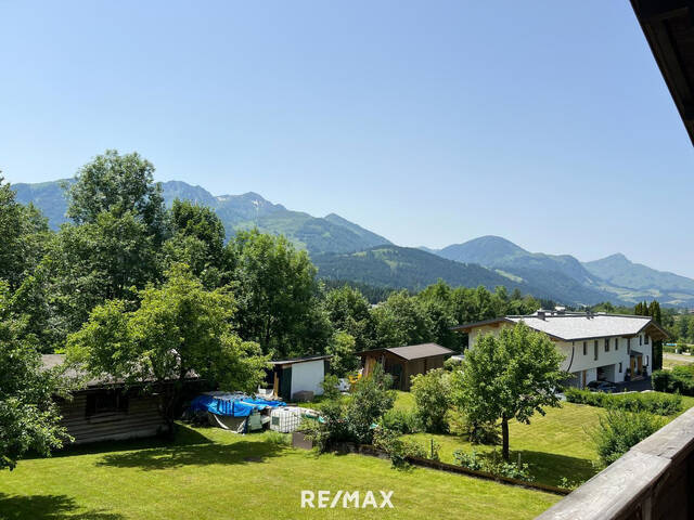 Immobilie in Hochfilzen - Traumgrundstück mit teilsaniertem Bestand in einzigartiger Aussichtslage auf Fieberbrunn - Bild 0