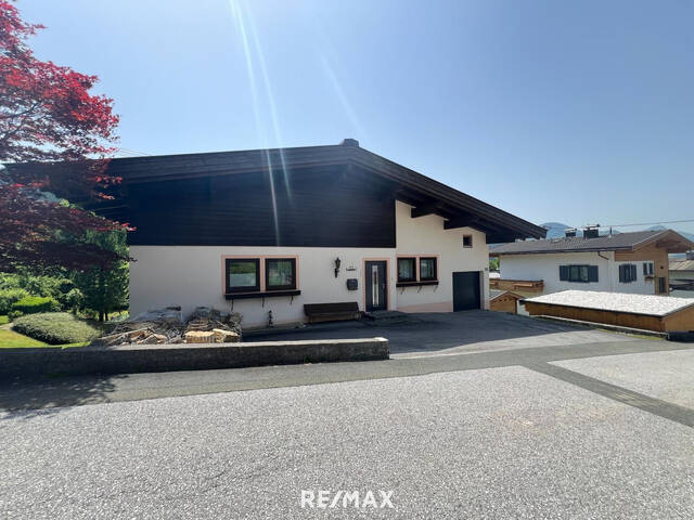 Immobilie in Hochfilzen - Traumgrundstück mit teilsaniertem Bestand in einzigartiger Aussichtslage auf Fieberbrunn - Bild 2