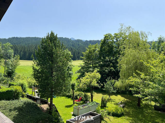 Immobilie in Hochfilzen - Traumgrundstück mit teilsaniertem Bestand in einzigartiger Aussichtslage auf Fieberbrunn - Bild 3