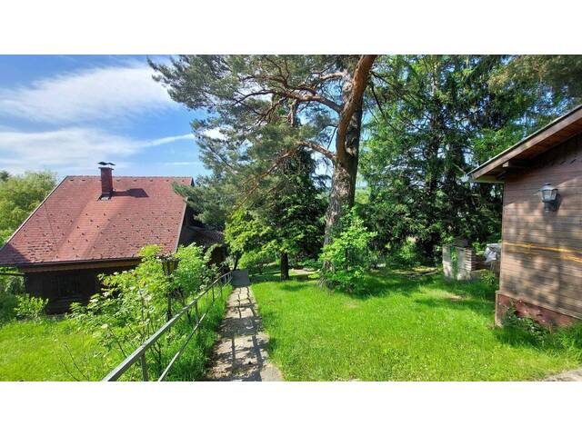 Immobilie in Eichgraben - Ausbaufähiges Holzhaus mit großem Grundstück in Eichgraben - Bild 0