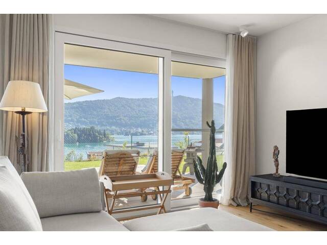 Immobilie in Pörtschach - Neuwertige Gartenwohnung mit faszinierendem Seeblick - Bild 1