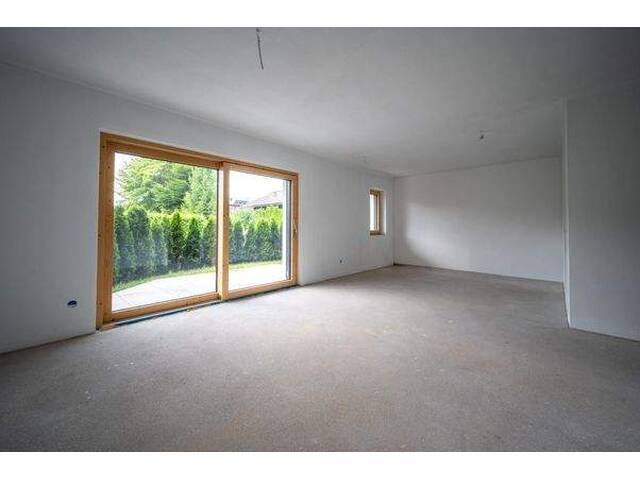 Immobilie in Kössen - Exklusive Neubau-Gartenwohnung in Sonnenlage von Kössen - Bild 0