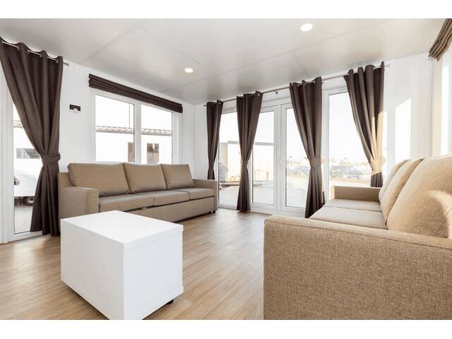 Immobilie in Markt Piesting - Stilvoller Holz-Bungalow mit Klimaanlage und Maßküche - Bild 3