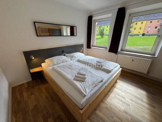 Immobilie in Eisenerz - Moderne Anlagewohnung mit Mietvertrag bis 12/2025 - Infrarotsauna & Balkon - Bild 1