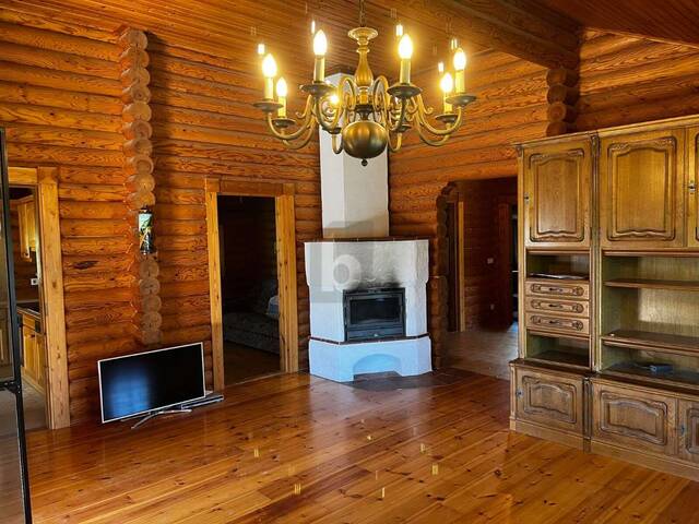 Immobilie in Enzersfeld im Weinviertel - CHARMANTES BLOCKHAUS IN EXKLUSIVER LAGE - Bild 1