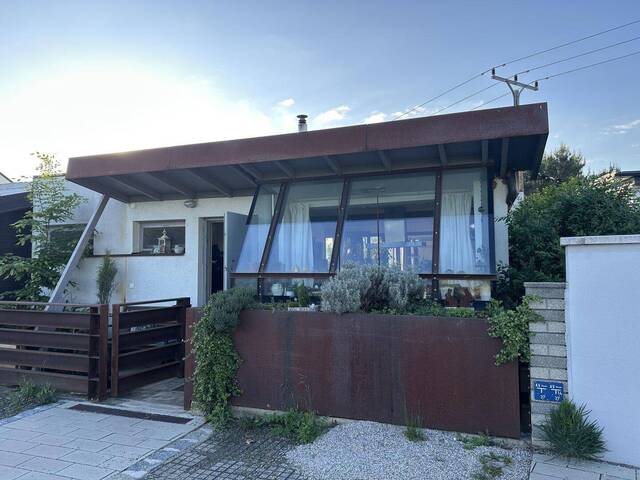 Immobilie in Steinbrunn - AM SEE LEBT ES SICH GUT! Neuwertiger Bungalow, direkt am Neufelder See IV - Bild 1