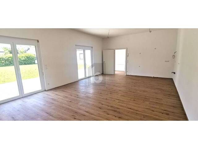 Immobilie in Sollenau - MODERNE KLARHEIT - SÜDSEITIGER GARTEN - Bild 1