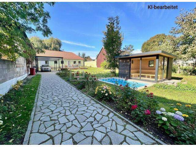 Immobilie in Herzogbirbaum - Einfamilienhaus in Herzogbirbaum mit Bauland-Agrar 2000m2: Vier Wohneinheiten bebaubar! - Bild 0