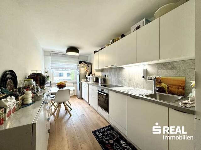 Immobilie in Wolfurt - Modernisierte 4-Zimmerwohnung mit Balkon und Garagenbox - Bild 1