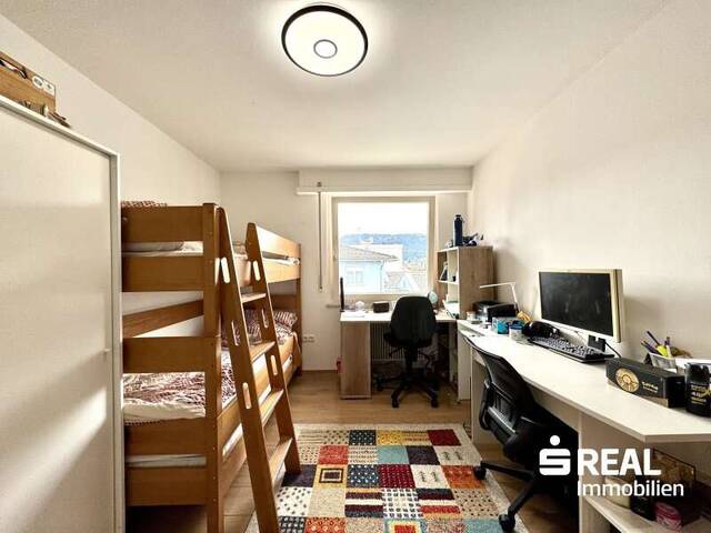 Immobilie in Wolfurt - Modernisierte 4-Zimmerwohnung mit Balkon und Garagenbox - Bild 4