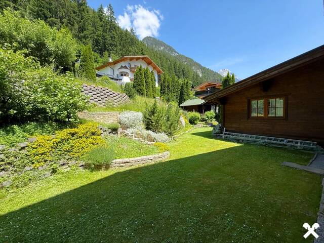 Immobilie in Schnann - Attraktive Investitionschance: Großes Mehrparteienhaus mit viel Potenzial bei St. Anton am Arlberg - Bild 2