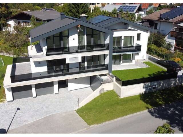 Immobilie in Saalfelden am Steinernen Meer - Moderne dreistöckige Wohnung mit Gartenanteil im Dreiparteienhaus in zentrumsnaher Lage! - Bild 0