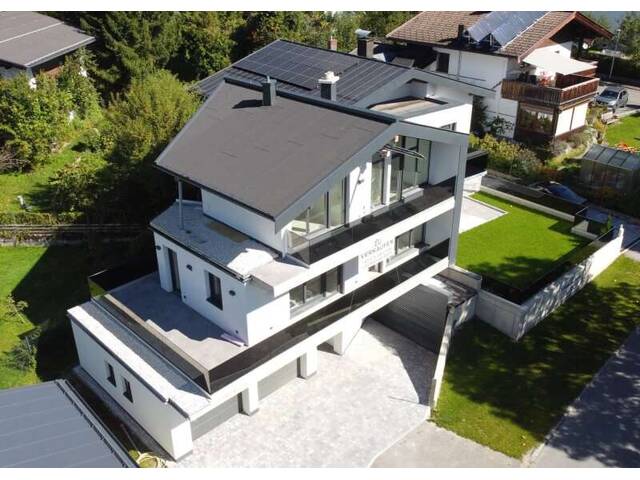 Immobilie in Saalfelden am Steinernen Meer - Moderne dreistöckige Wohnung mit Gartenanteil im Dreiparteienhaus in zentrumsnaher Lage! - Bild 1