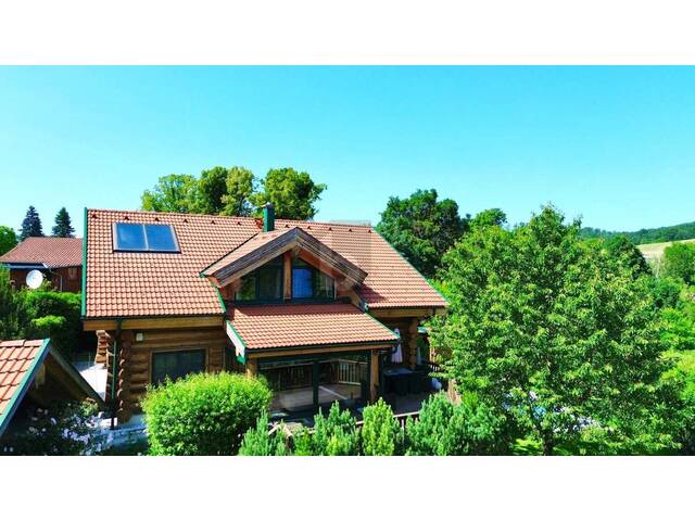 Immobilie in Sulz im Wienerwald - ROMANTISCHES UND MODERNES NATURSTAMMBLOCKHAUS MIT NEUEM POOL! - Bild 0