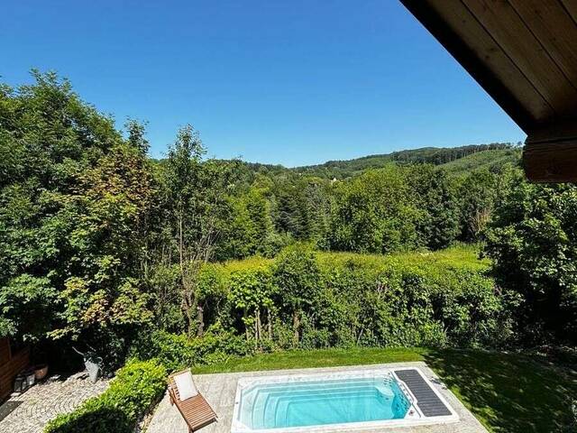 Immobilie in Sulz im Wienerwald - ROMANTISCHES UND MODERNES NATURSTAMMBLOCKHAUS MIT NEUEM POOL! - Bild 2