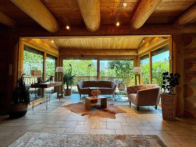 Immobilie in Sulz im Wienerwald - ROMANTISCHES UND MODERNES NATURSTAMMBLOCKHAUS MIT NEUEM POOL! - Bild 3