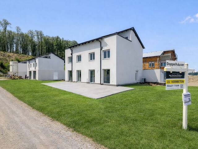 Immobilie in Attnang-Puchheim - Leistbare Neubau Doppelhäuser 128 m², Kauf ab nur € 1.505,- /Monat, hohe Förderung fix 1,5%/20 J., Galerie, Dachterrasse, Eigengarten, Einzelgarage - Bild 0