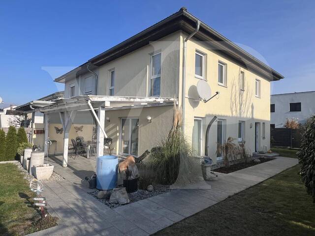 Immobilie in Pasching - Charmante Doppelhaushälfte in zentraler Siedlungslage - Bild 1