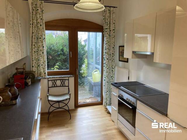 Immobilie in Grieskirchen - Großzügige, sanierte EG Wohnung mit kleiner Einliegerwohnung, Wintergarten und Autoabstellplatz - Grieskirchen - Bild 1