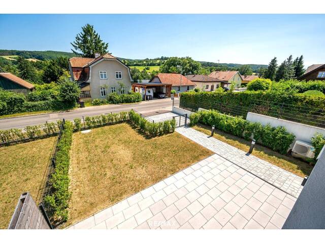 Immobilie in Tulbing - Familienhaus-Erstbezug am Fuße des Wienerwaldes: Super Verkehrsanbindung nach Wien - Bild 1