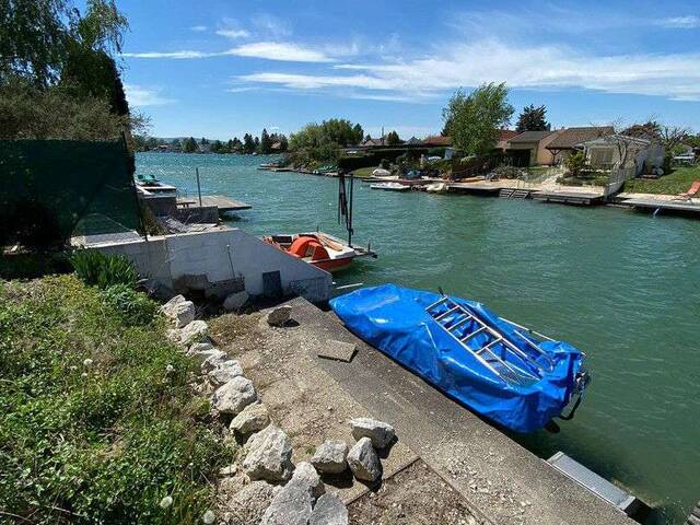 Immobilie in Neufeld an der Leitha - Haus am See, Seezugang, Einfamilienhaus, Bungalow, Grundstück, Pachtgrund - Bild 2