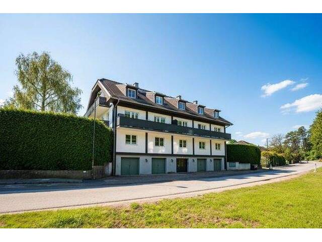 Immobilie in Irenental - Reizende 3-Zimmer-Wohnung mit 2 Balkonen, gartenseitiger Veranda und Garagenplatz - Bild 1