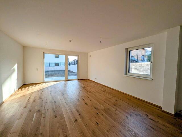 Immobilie in Hallwang - Wohnen wie im eigenen Haus: 3-Zimmer-Neubau mit Garten & Terrasse in Hallwang (ohne Käuferprovision & Wohnbauförderung möglich)! - Bild 1