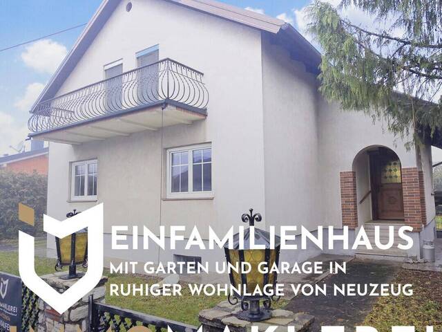 Immobilie in Neuzeug / Neuzeug - EINFAMILIENHAUS MIT GARTEN UND GARAGE IN RUHIGER WOHNLAGE VON NEUZEUG - Bild 0