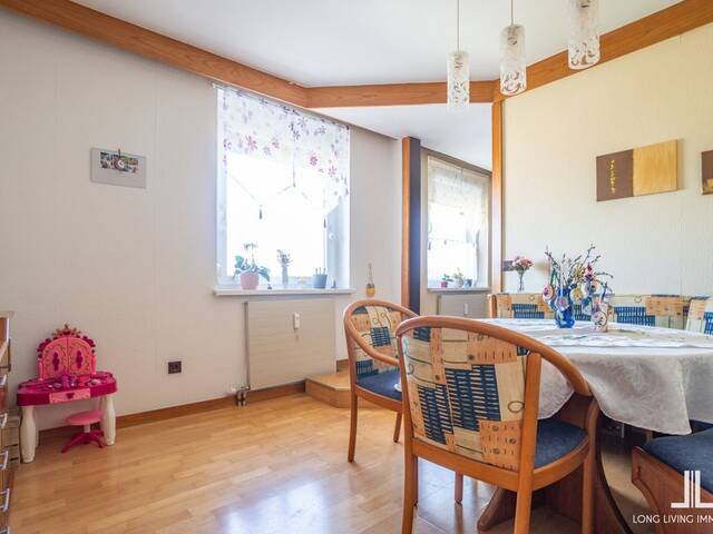 Immobilie in Kalsdorf bei Graz - TIEFGARAGE IM KAUFPREIS ENTHALTEN - Lichtdurchflutete Wohnung im letzten Lift-Stock mit Loggia - Bild 2