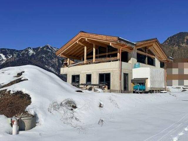 Immobilie in Waidring - WAIDRING - Neubau - Exklusives Landhauschalet in unvergleichlicher Panoramalage – Rohbau oder schlüsselfertig - Bild 0