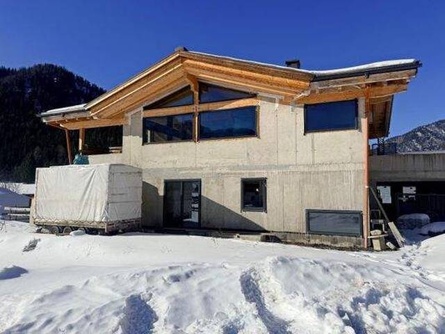 Immobilie in Waidring - WAIDRING - Neubau - Exklusives Landhauschalet in unvergleichlicher Panoramalage – Rohbau oder schlüsselfertig - Bild 1