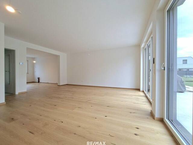 Immobilie in Wien - Erstbezug - geräumige Doppelhaushälfte in ruhiger Lage in Essling - Bild 1