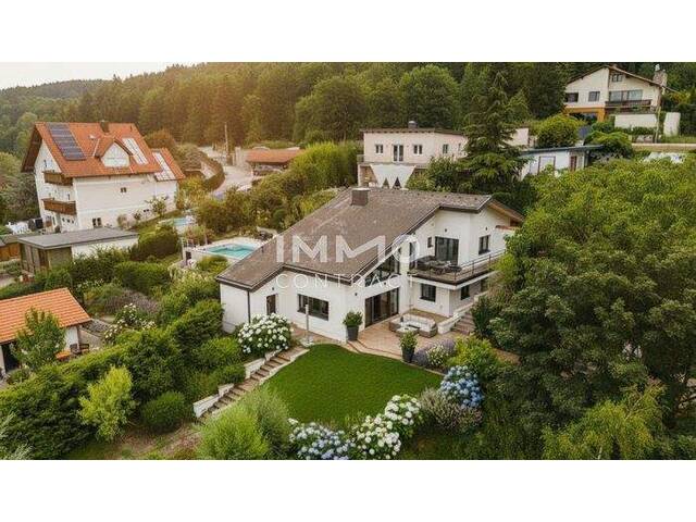 Immobilie in Hainburg an der Donau - Fernblick Refugium am Hexenberg - Exklusive Architektenvilla in Besthanglage mit Schwimmteich und Gästehaus - Bild 0