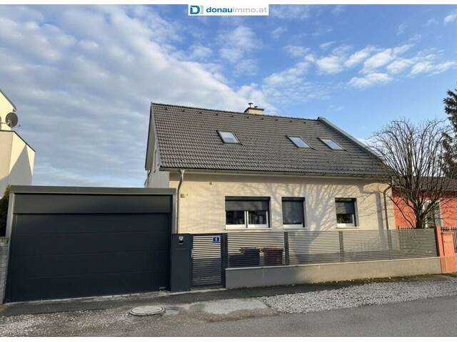Immobilie in Himberg - 2325 Himberg Modernes Einfamilienhaus mit vielseitigen Nutzungsmöglichkeiten in ruhiger Vorstadtlage - Bild 0