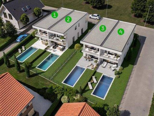 Immobilie in Edt - EDT-Living - Exklusive Luxus-Doppelhaushälfte mit Pool, Panorama-Glasfronten und traumhafter Nähe zur Traun - Haus 3 - Bild 1