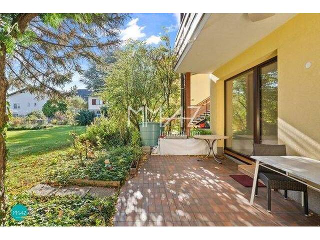 Immobilie in Maria Enzersdorf - Gut geschnittene Maisonette Wohnung mit Eigengarten in grüner Ruhelage! Einziehen & Wohlfühlen! - Bild 0