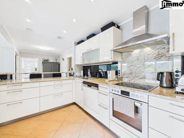 Immobilie in Pörtschach am Wörther See - Traumwohnung mit Pool und Seeblick! - Bild 1